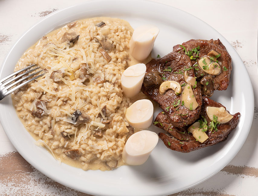 Risotto con hongos y palmito con filete a la mostaza