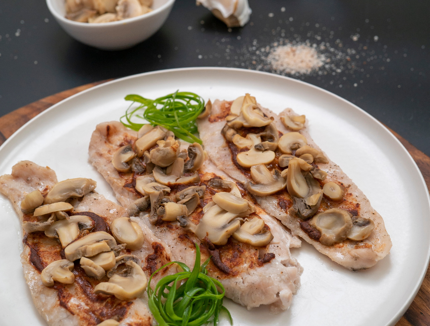 Corvina con hongos Richly