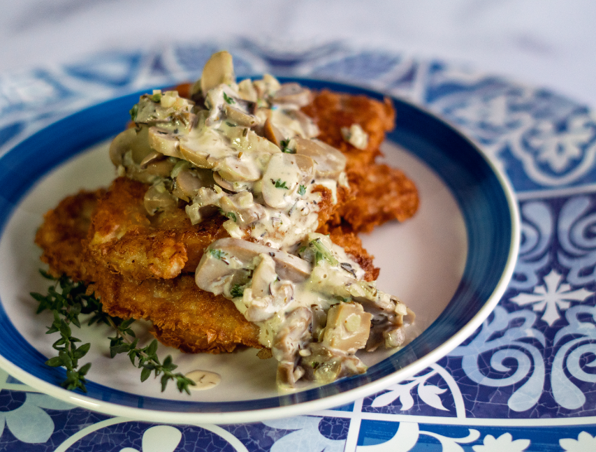 Milanesa con salsa de hongos